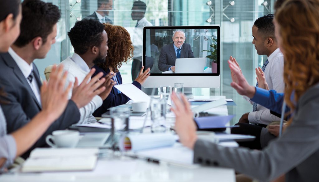 Business people looking at a screen during a video conference